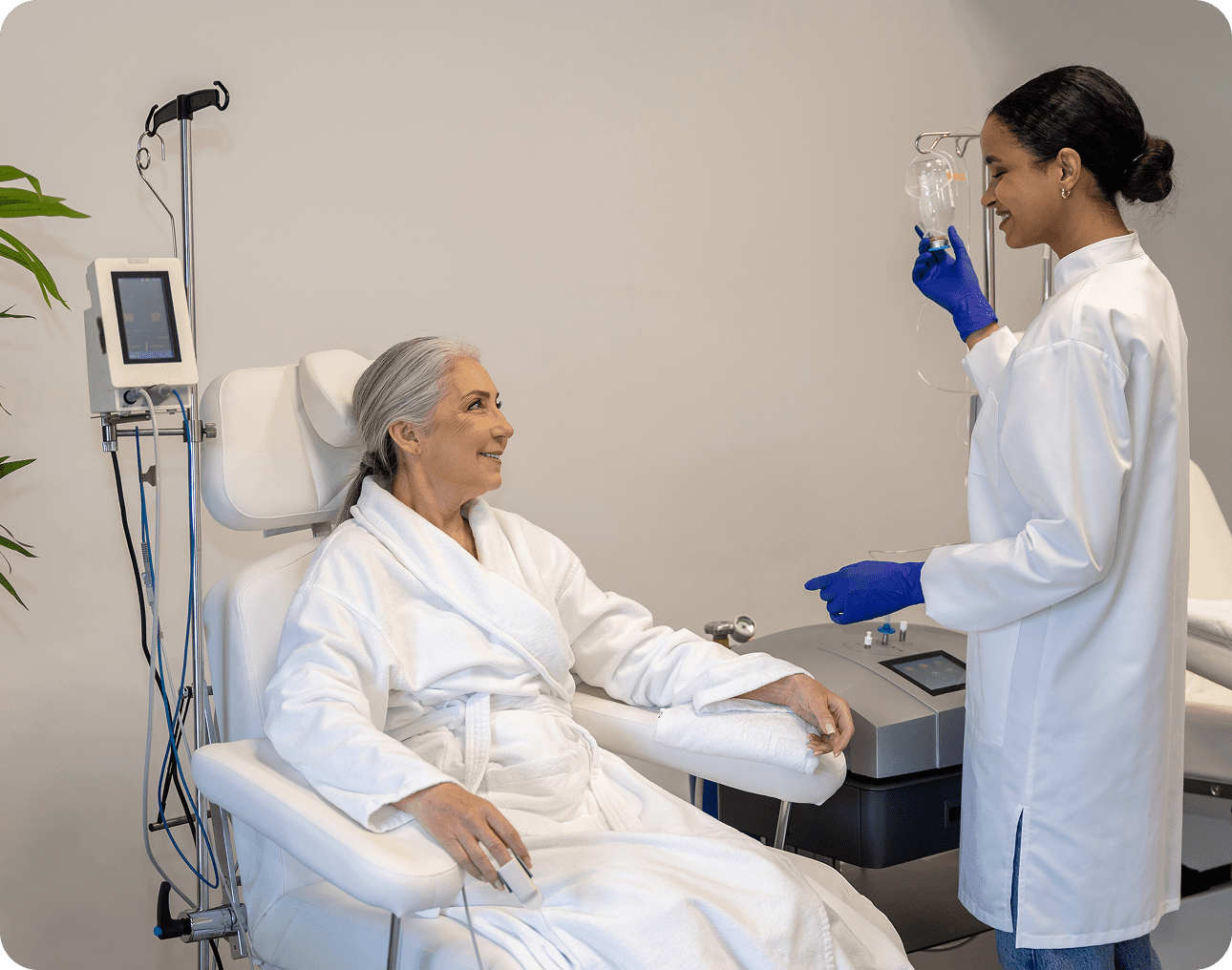 Patient receiving IV therapy from healthcare worker.